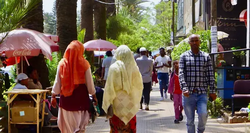 Pedestrians in Addis Ababa, Ethiopia enjoying a convenient and safe walkway